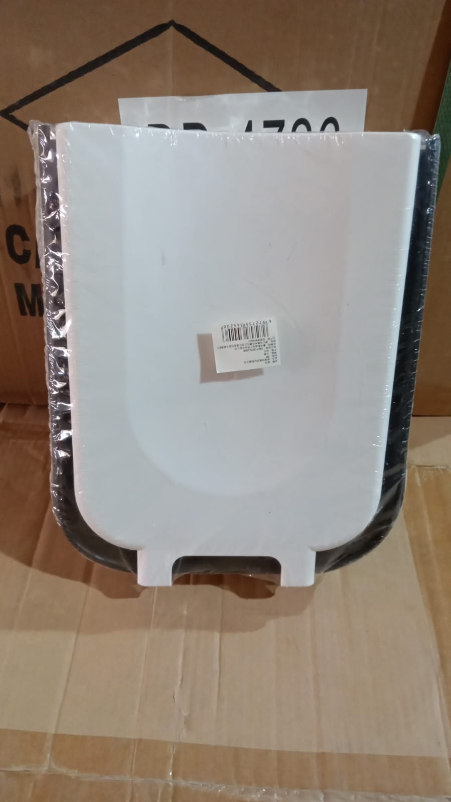 Small hanging trash can for easy disposal in tight spaces. Small hanging trash can for easy disposal in tight spaces.
